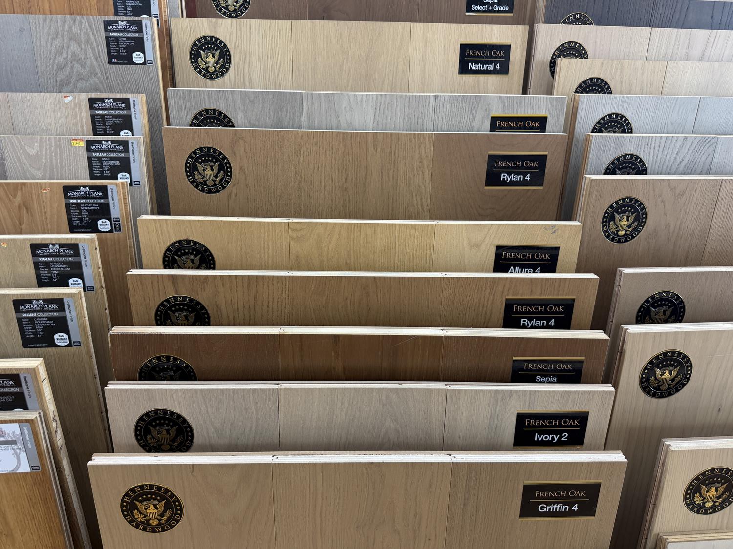 French Oak hardwood sample boards stamped with Hennessy Hardwood seals and named collection labels