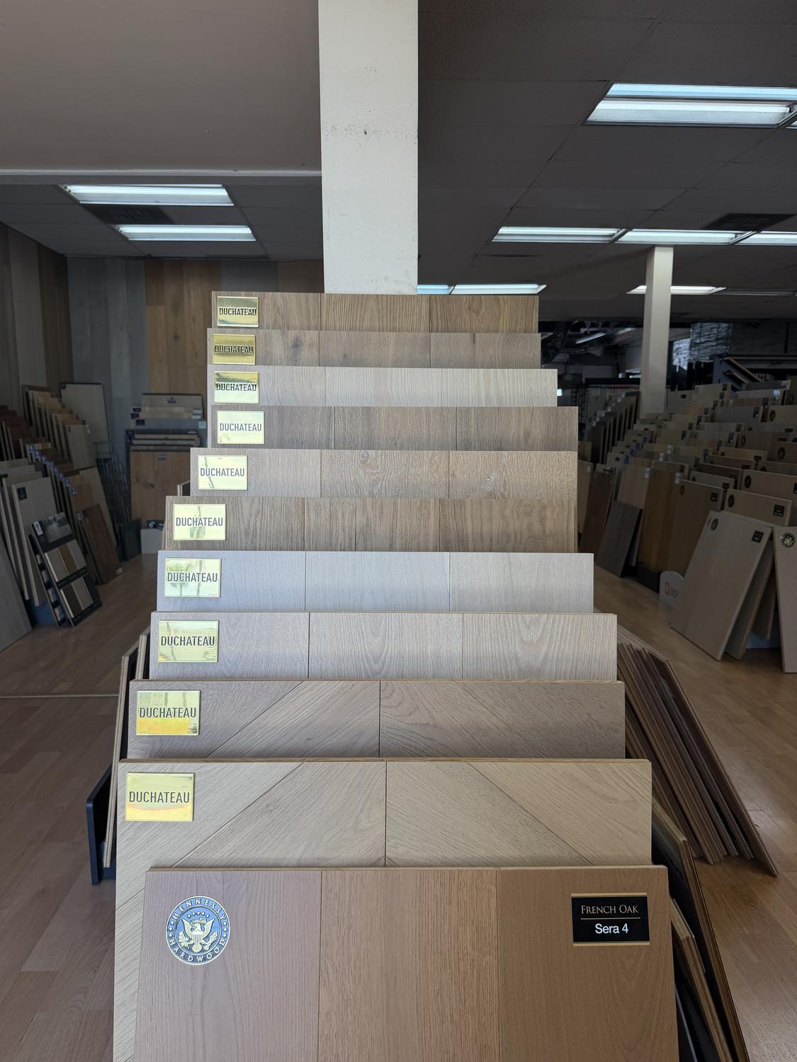 The main floor of the Express Carpet showroom in Anaheim, lined with flooring sample racks